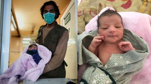 En pappa visar upp sin nyfödda son i Afghanistan, den nyfödda pojken.