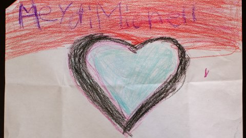 En teckning föreställande ett blått hjärta.
