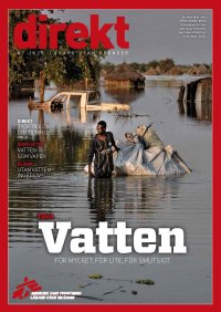 Omslag till Direkt. Man vadar genom vatten.