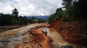 MSF team walking to village