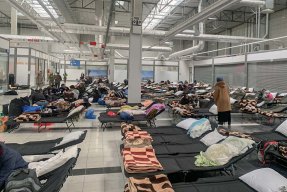 Ett mottagningscenter i Polen för flyktingar från Ukraina