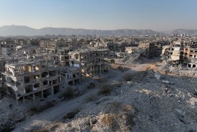 Sönderbombad stadsmiljö i Östra Ghouta