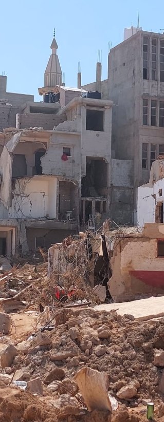 förstörda byggnader i Derna i Libyen efter stora översvämningar