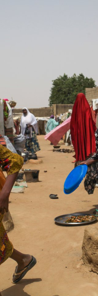Barn leker i ett läger i Maiduguri