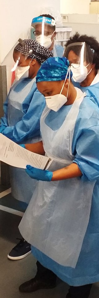 Sjukvårdspersonal med ansiktsmasker