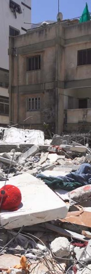 Förstörda hus i Gaza City efter bombanfall den 10 maj, 2021.