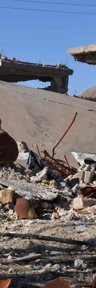 Förstörda hus i Kobane, Syrien. 