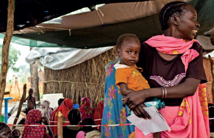 Kvinna med barn som fått medicinsk behandling i Kongo-Kinshasa